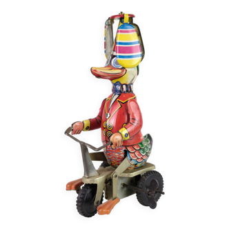 Canard de cirque sur tricycle, jouet en fer-blanc fabriqué par Schylling en Chine, années 1920