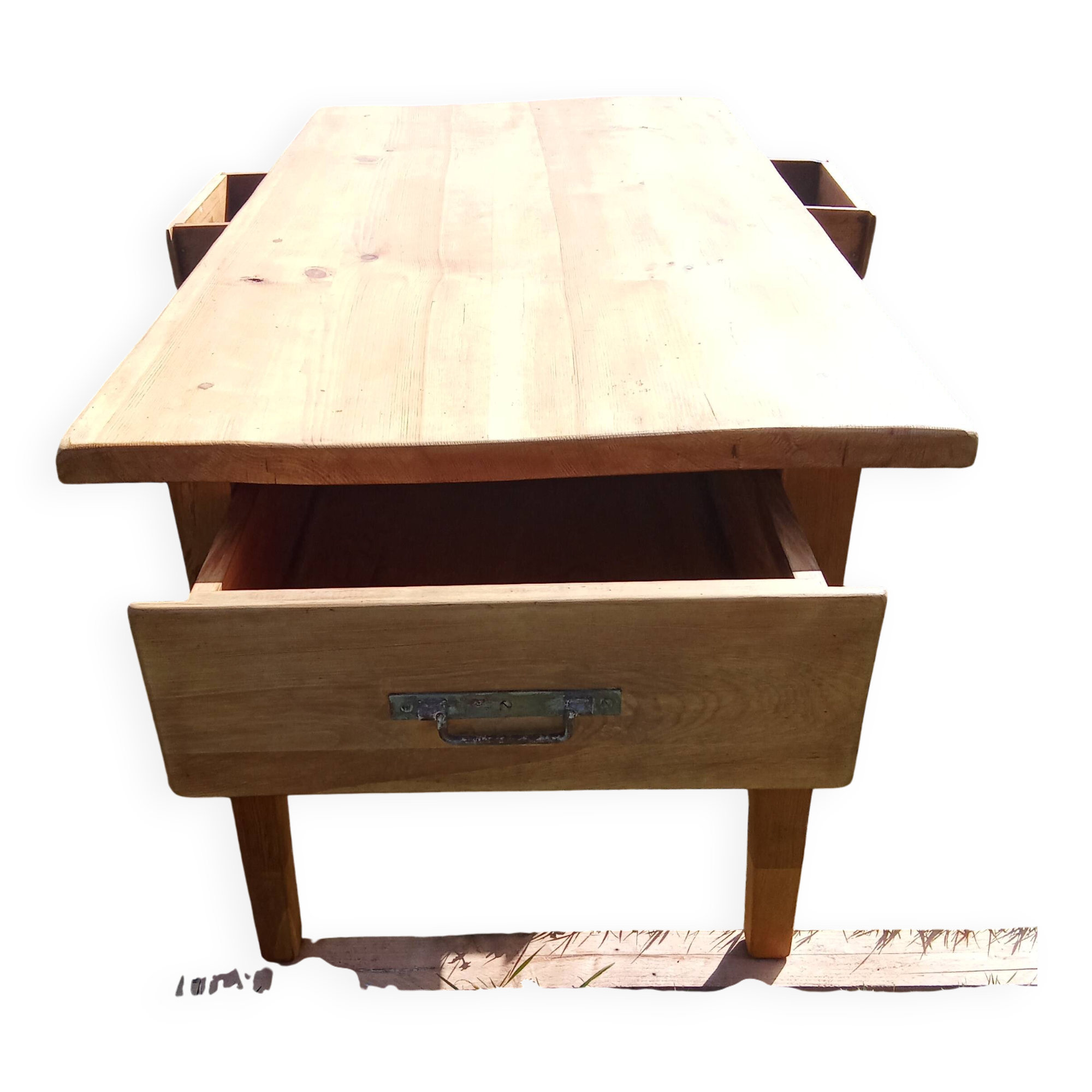 Old rustic farmhouse table made of solid wood.
