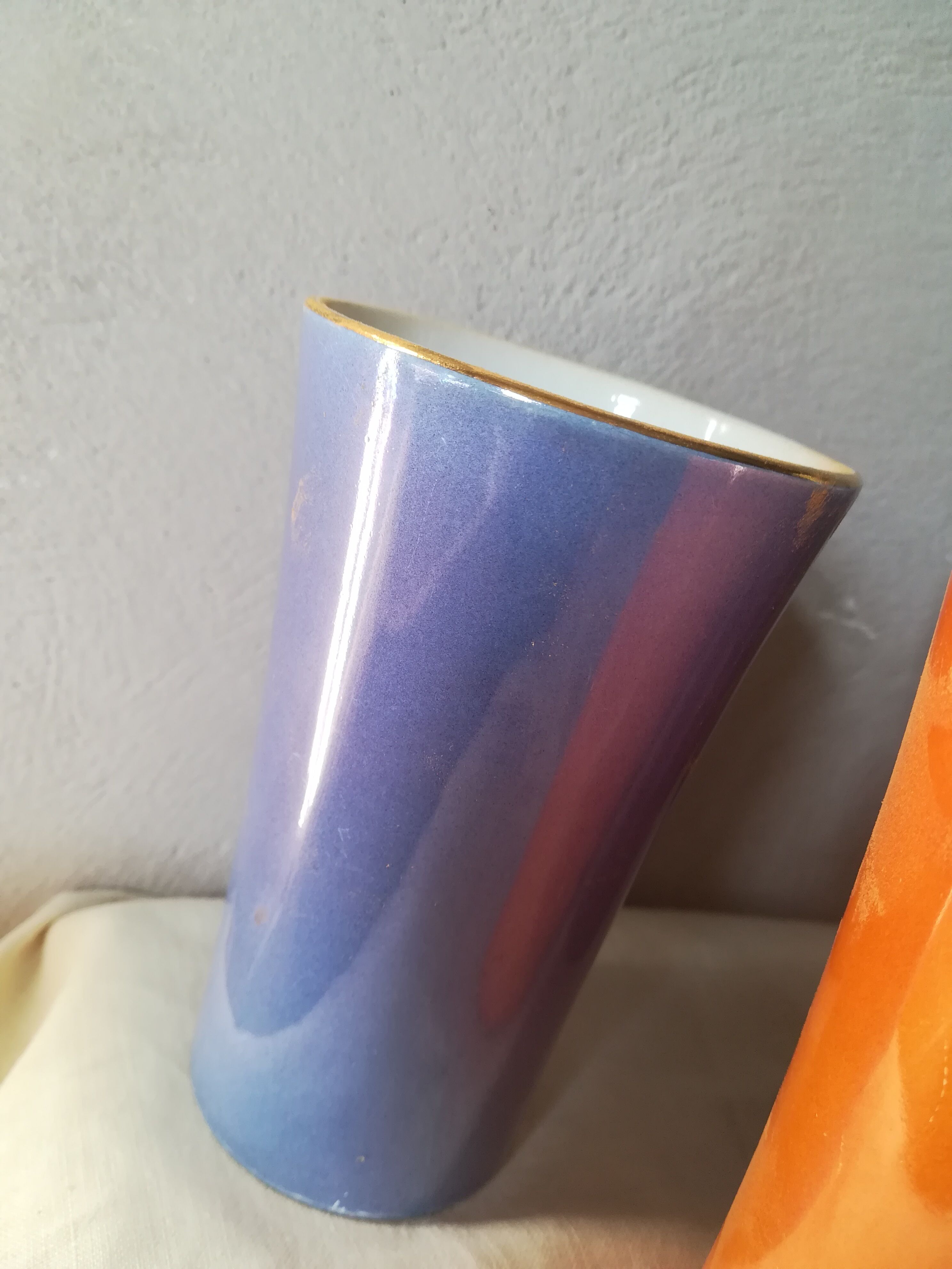 8 coloured cups in earthenware