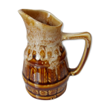 Vintage pitcher revol