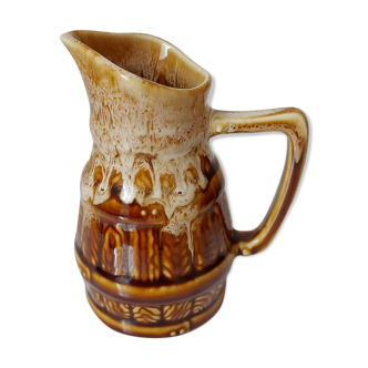 Vintage pitcher revol