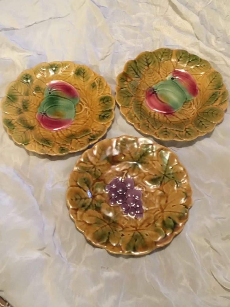 3 slip dessert plates stamped Sarreguemines. Fruit decor.