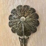 silver sprinkler spoon