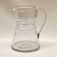 Ancienne carafe  pichet en verre soufflé  décor de feuilles ciselées 1940