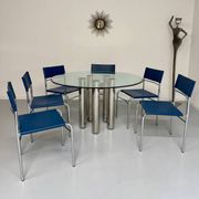 Round glass and metal dining table, Italian design from the 80s, vintage