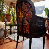 Louis XVI armchair with caning and dark green velvet