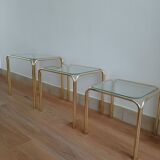 Glass and gold nesting table from the 70s