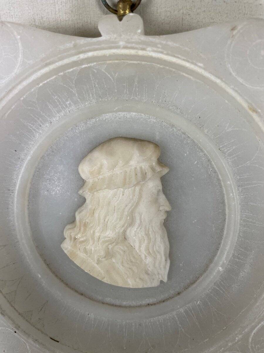 Three alabaster profiles of men, Italy around 1880
