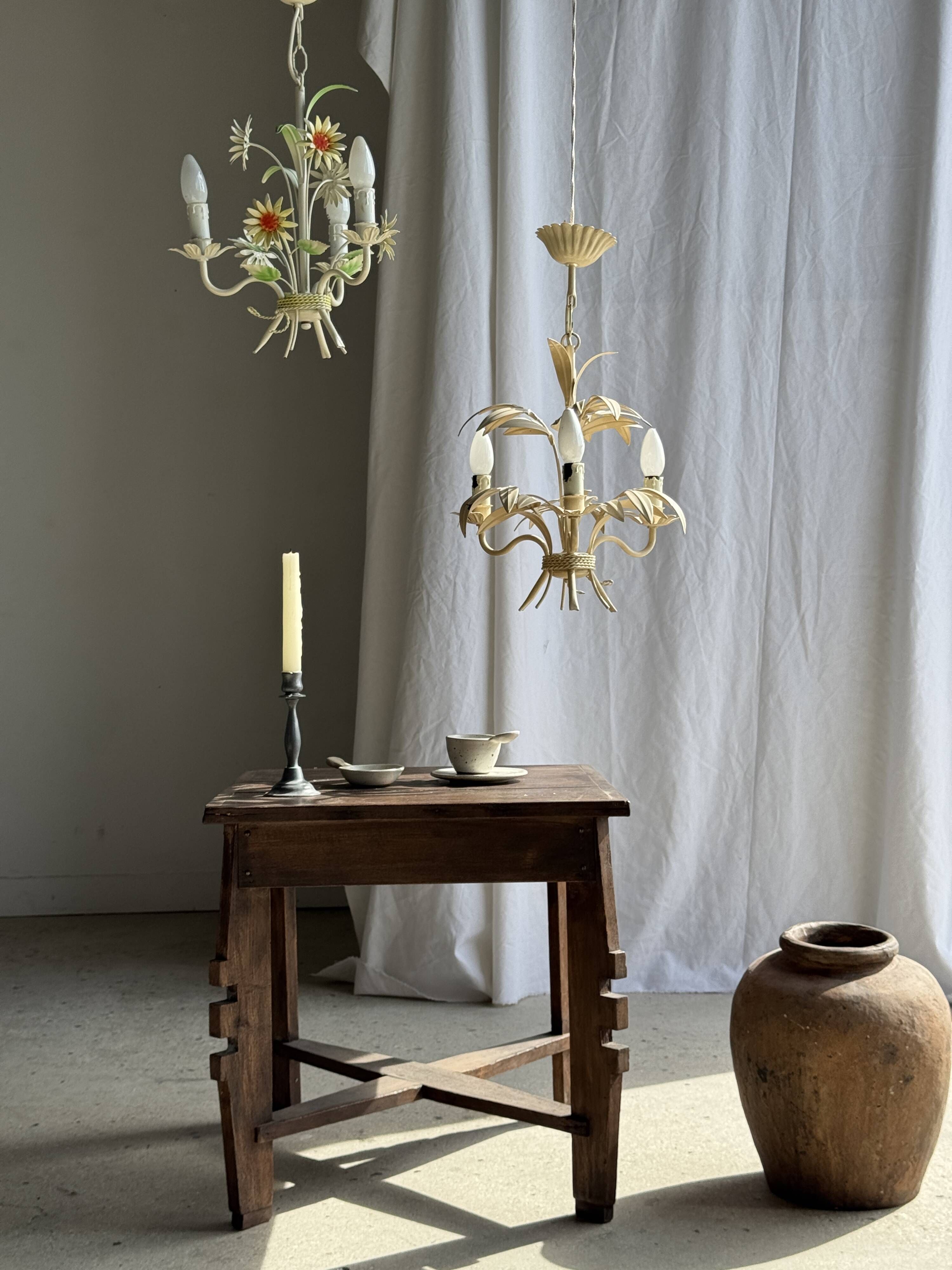Small vintage cream metal flower chandelier with orange flowers and 3 arms.