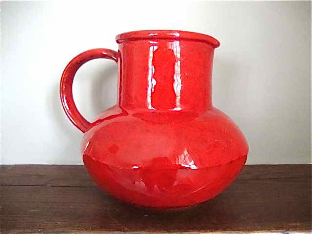 Red ceramic pitcher