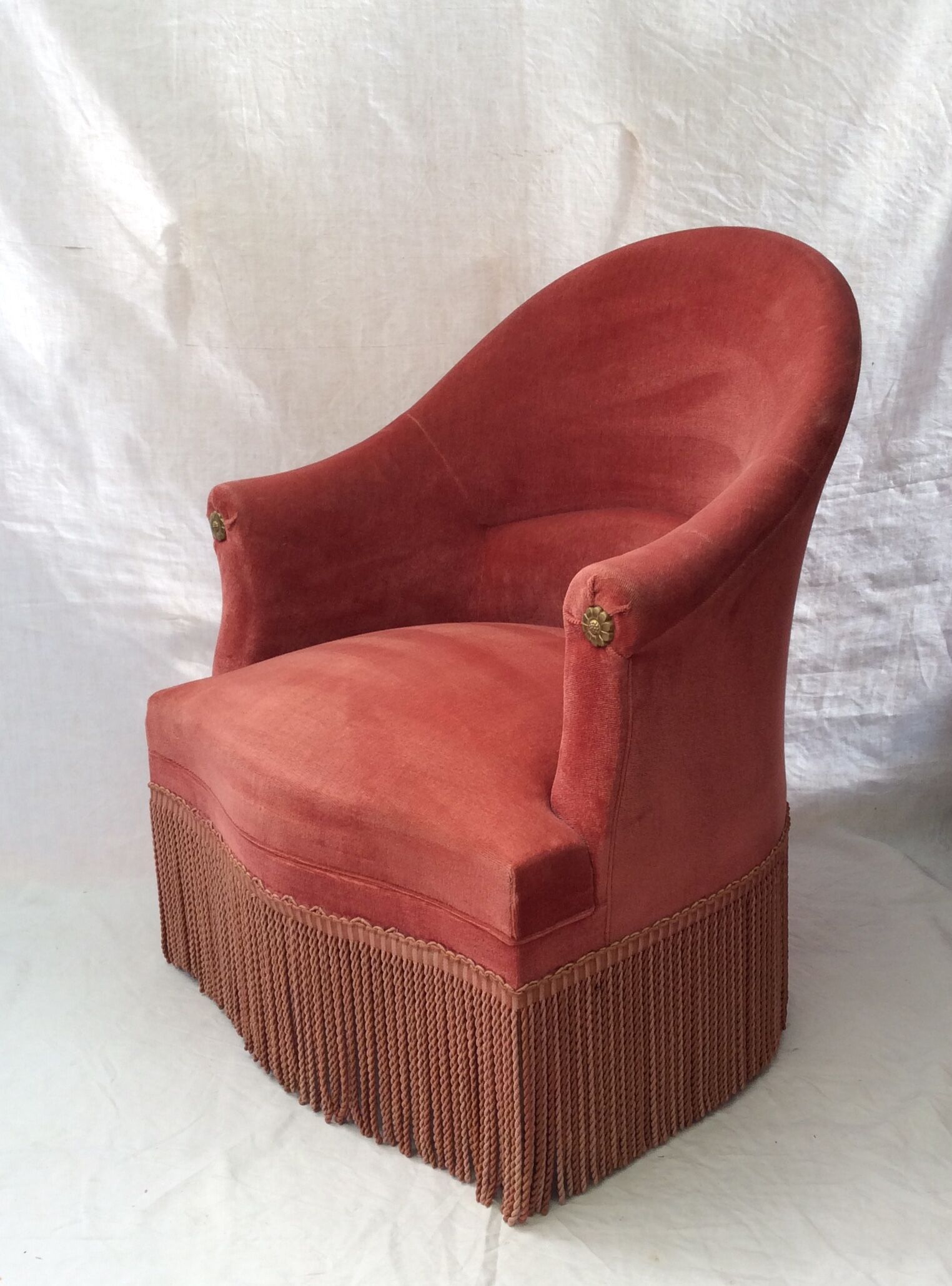 Pink velvet toad chair in the 1960s