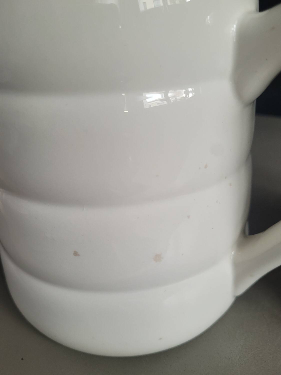 Pair of antique Gien porcelain pitchers