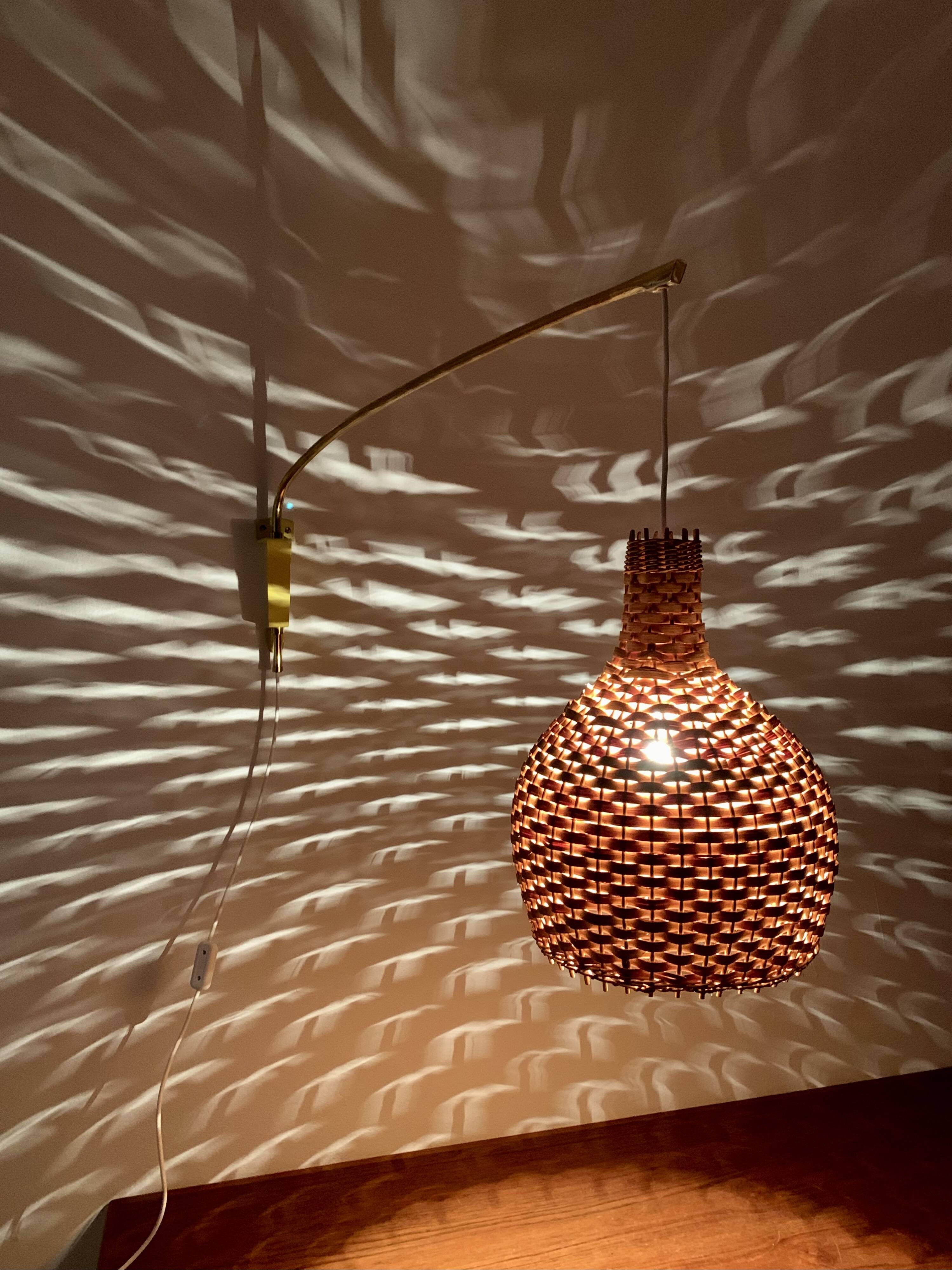 Adjustable Brass and Wicker Arc Sconce