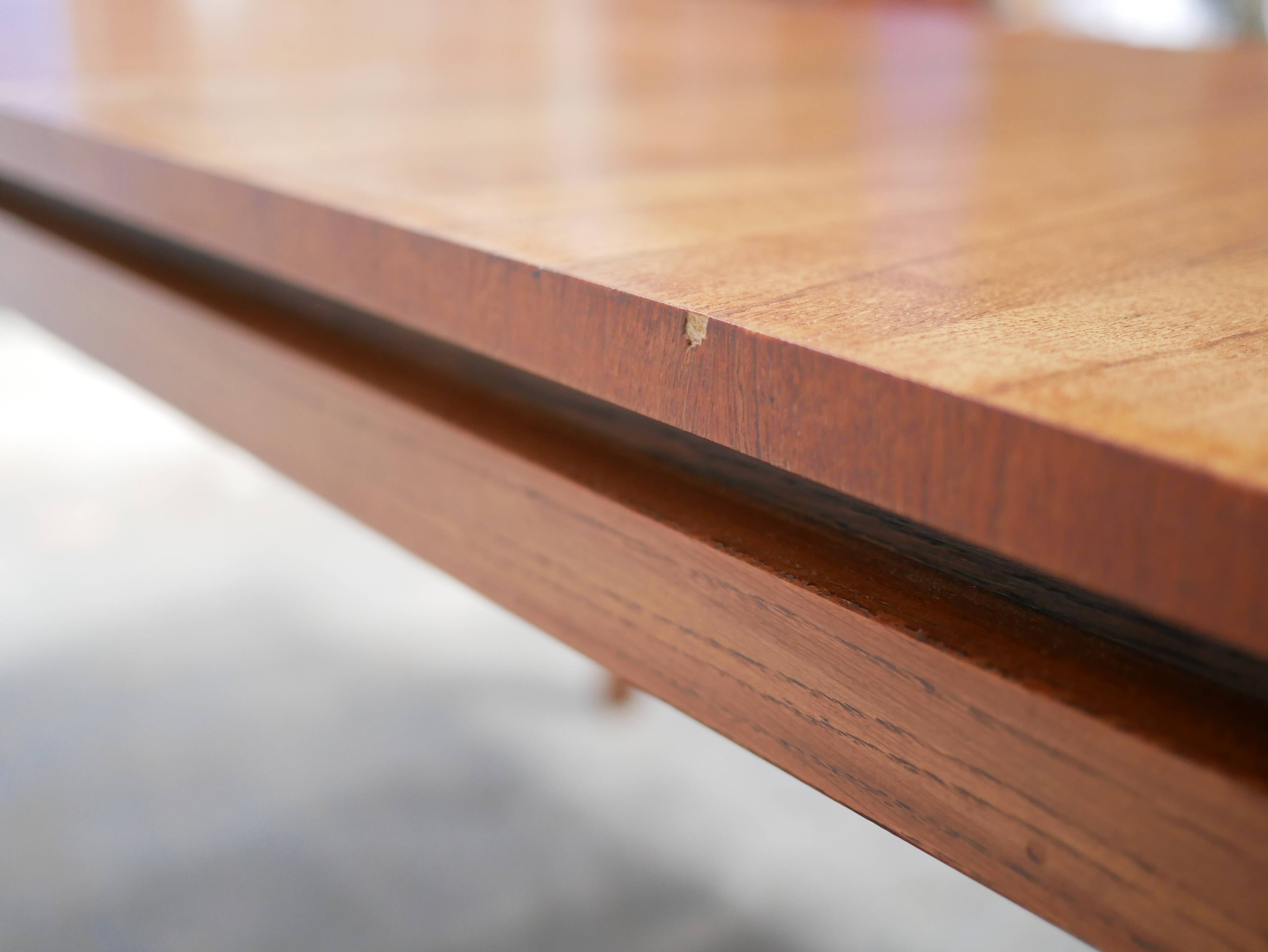 Extendable teak dining table by Gérard Guermonprez for Magnani editions