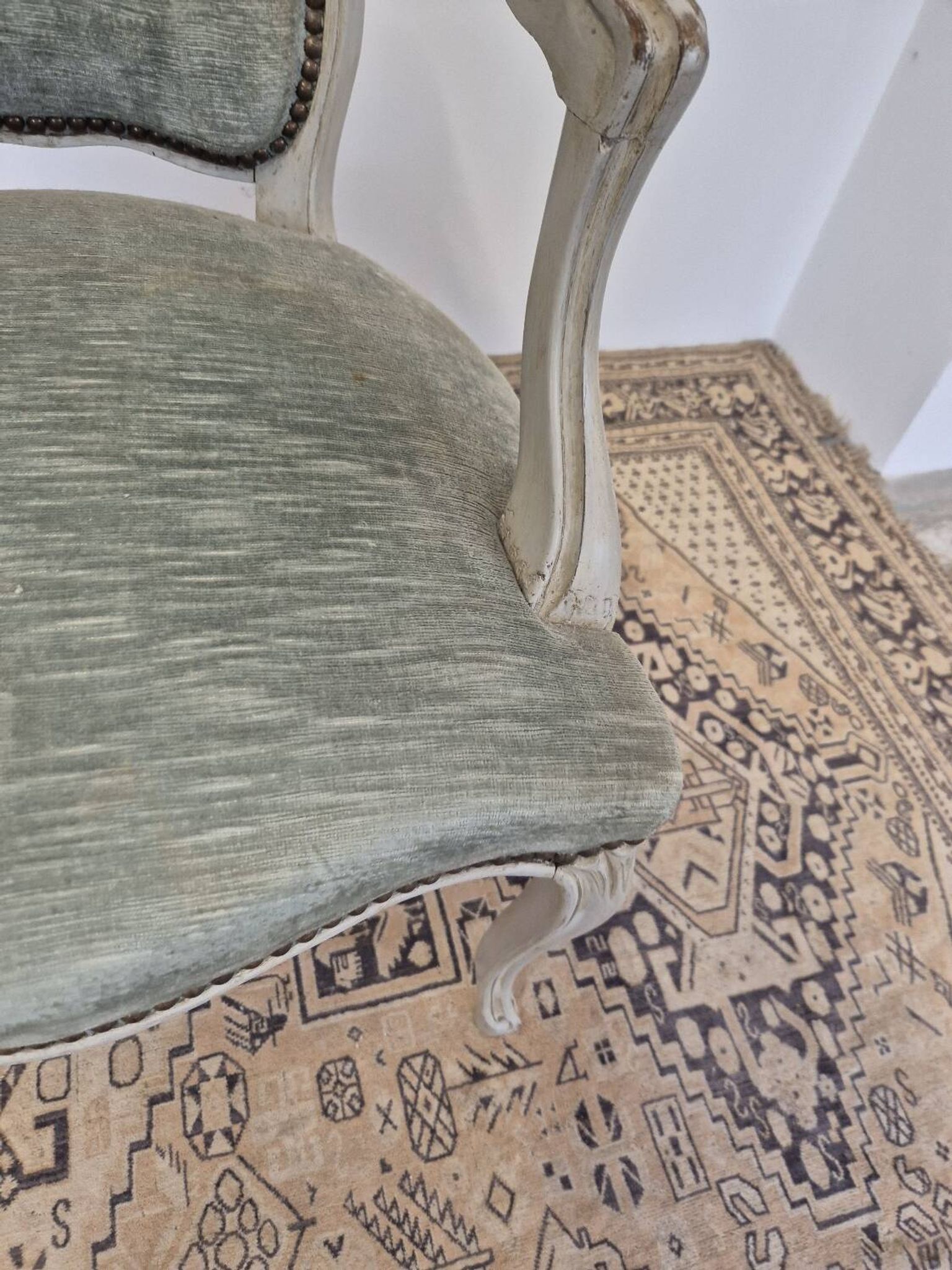 Louis XV style cabriolet armchair in patinated wood and velvet