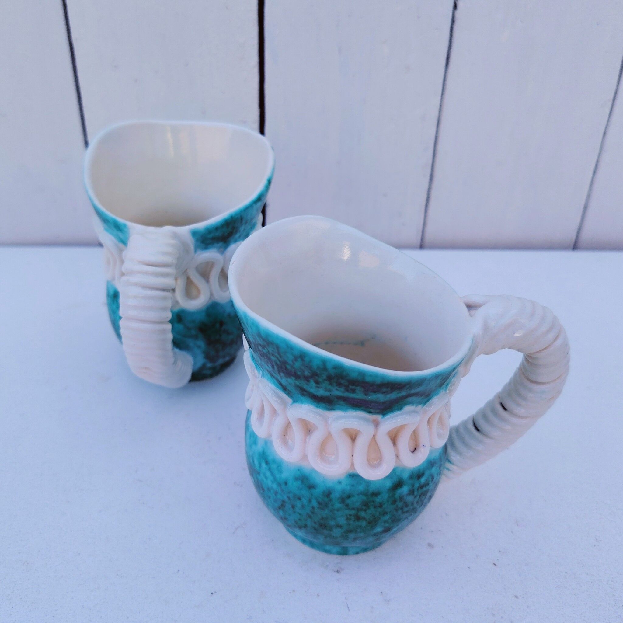 Pair of milk jugs/pitchers, Sainte Radegonde, G.Asch
