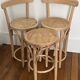 Pair of high chairs, curved wood and caning.