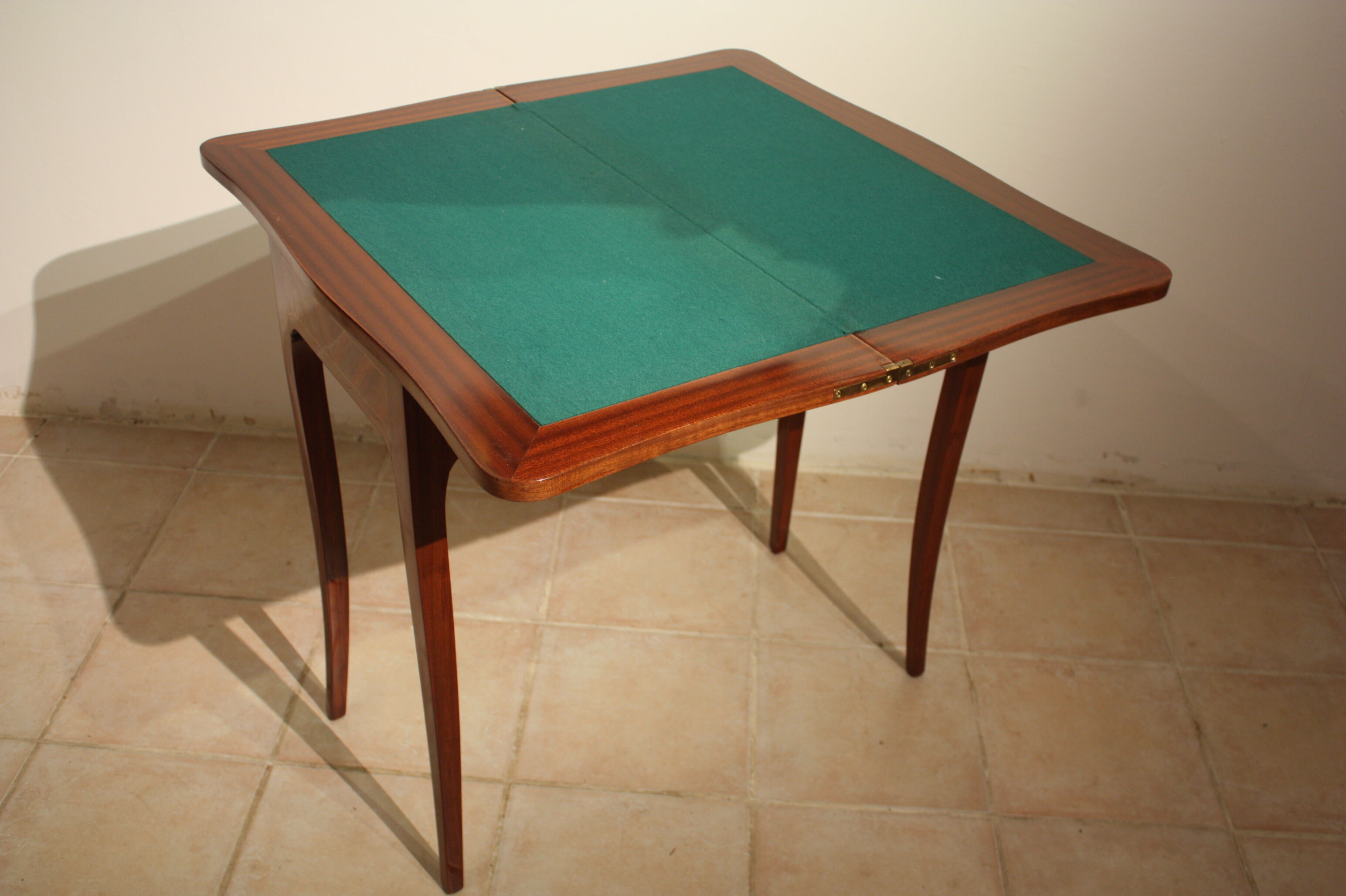 Mahogany game table in the Louis XV style