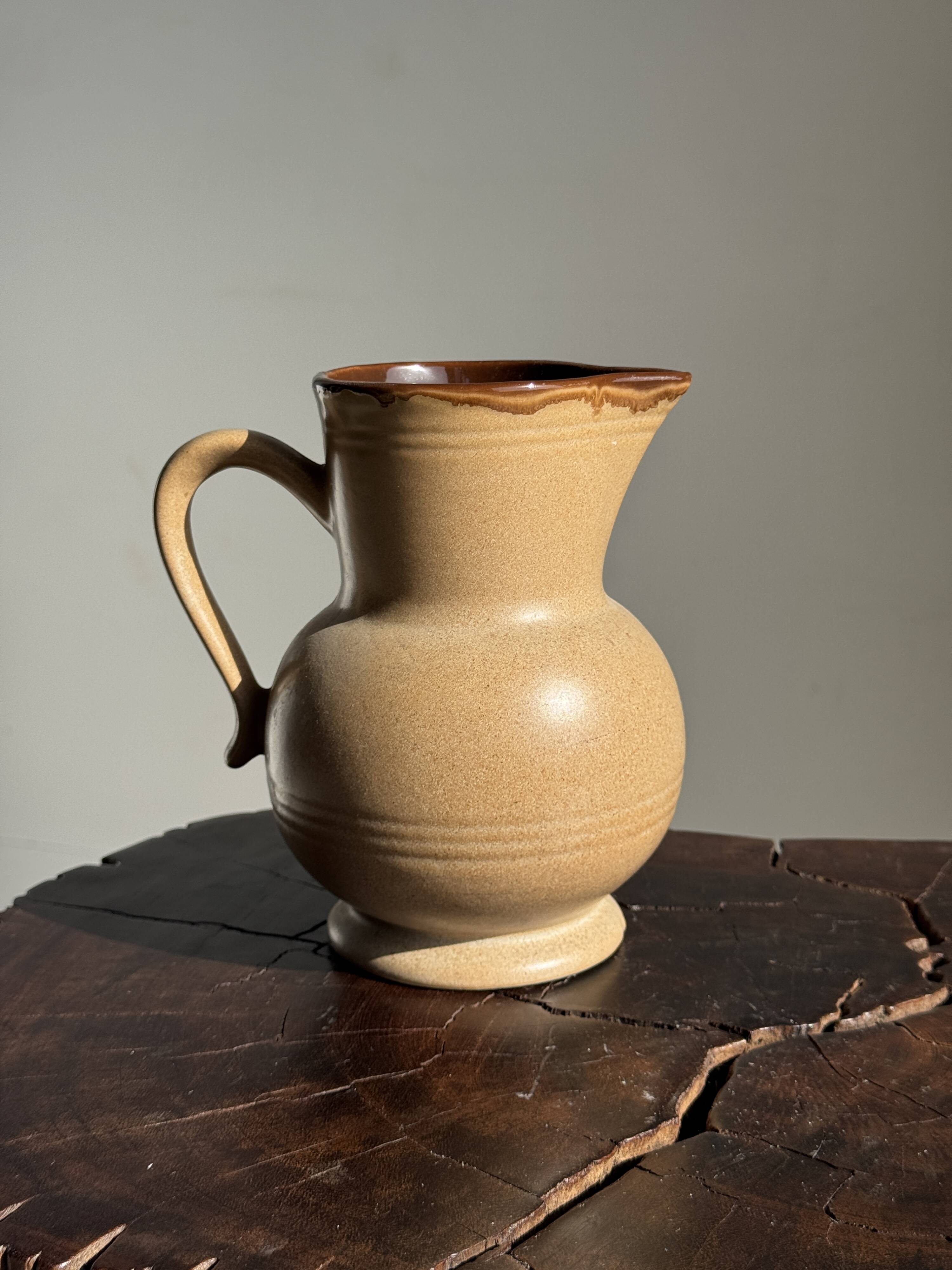 Vintage stoneware round carafe