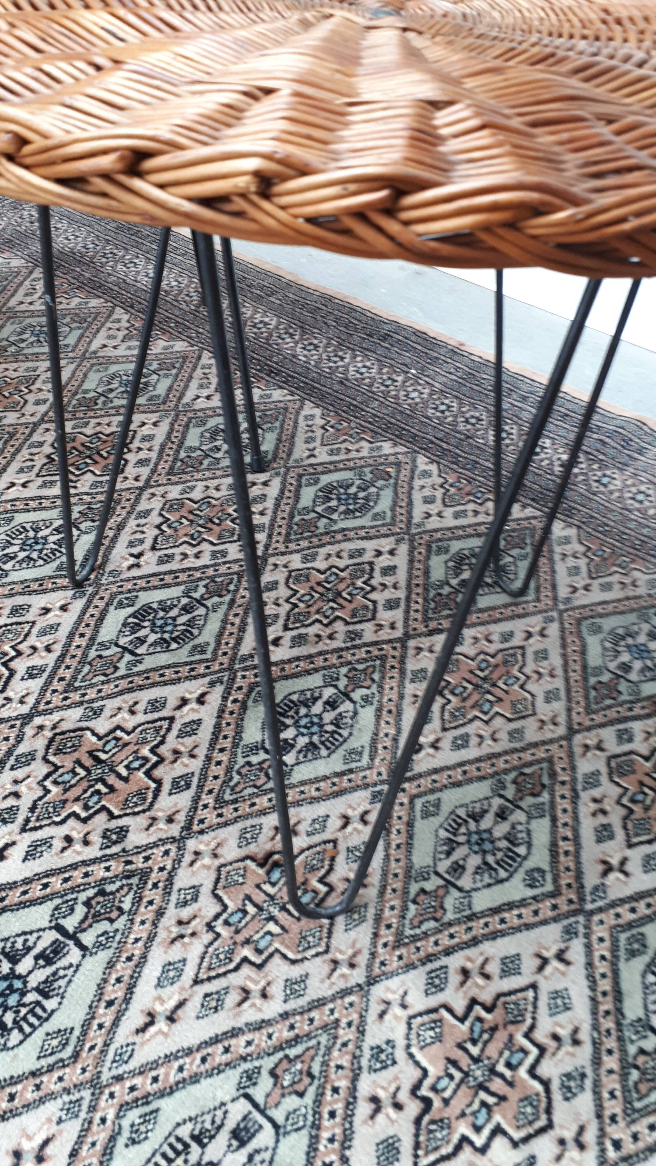 Set of armchairs "soleil" and rattan table of the years 50