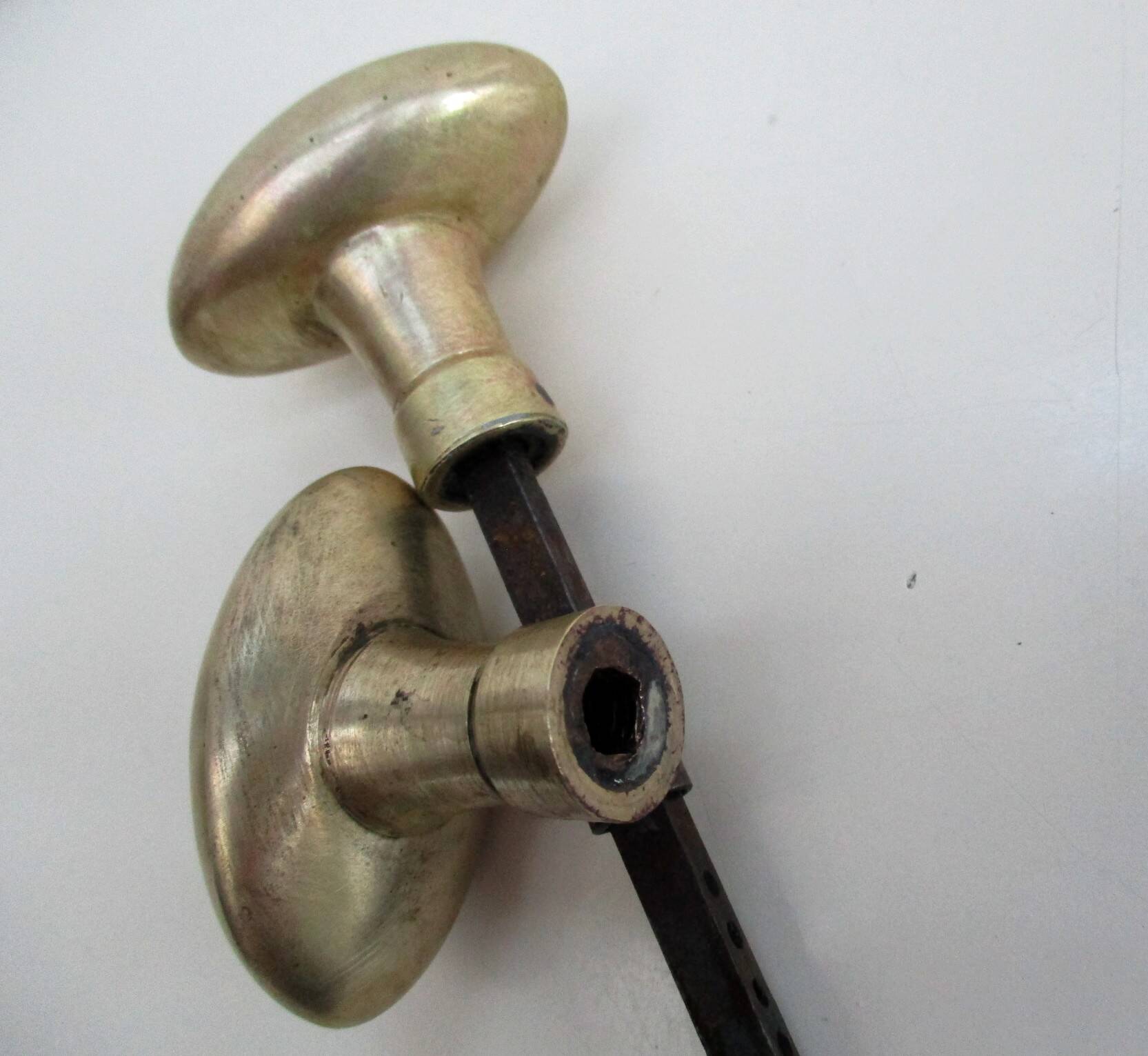 Antique oval brass door handles