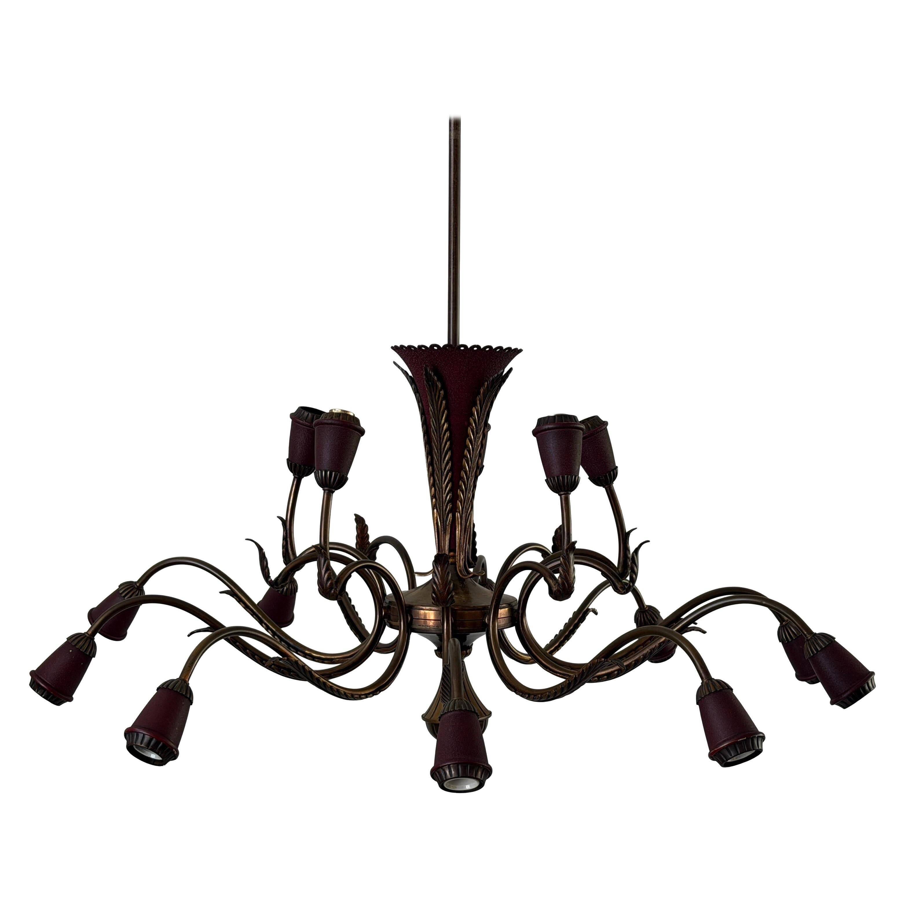 Large Burgundy brass chandelier with 15 arms, 1950, Italy