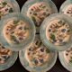 8 dessert plates in late 19th century dabbling