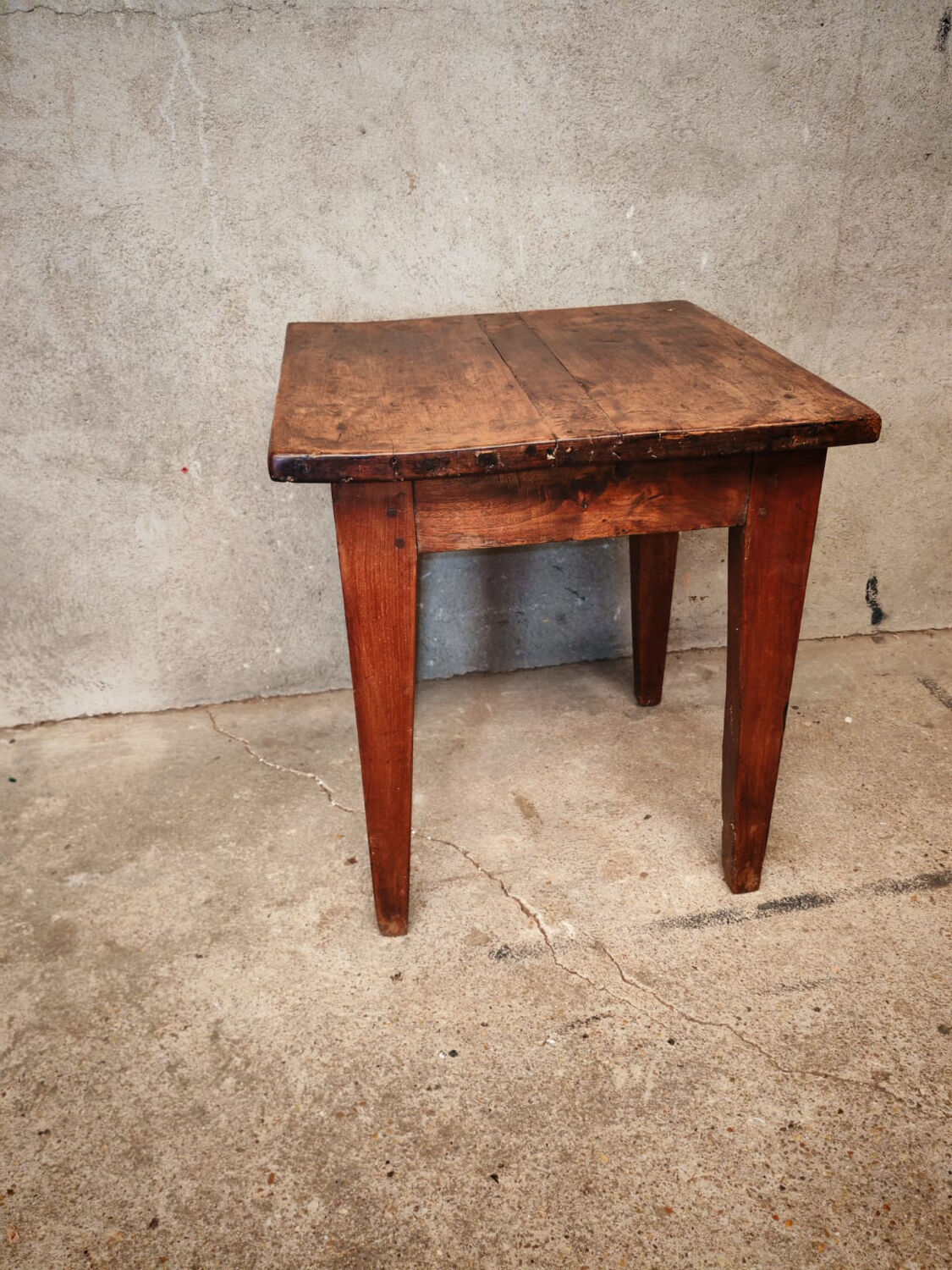 Small farmhouse table, low and square.