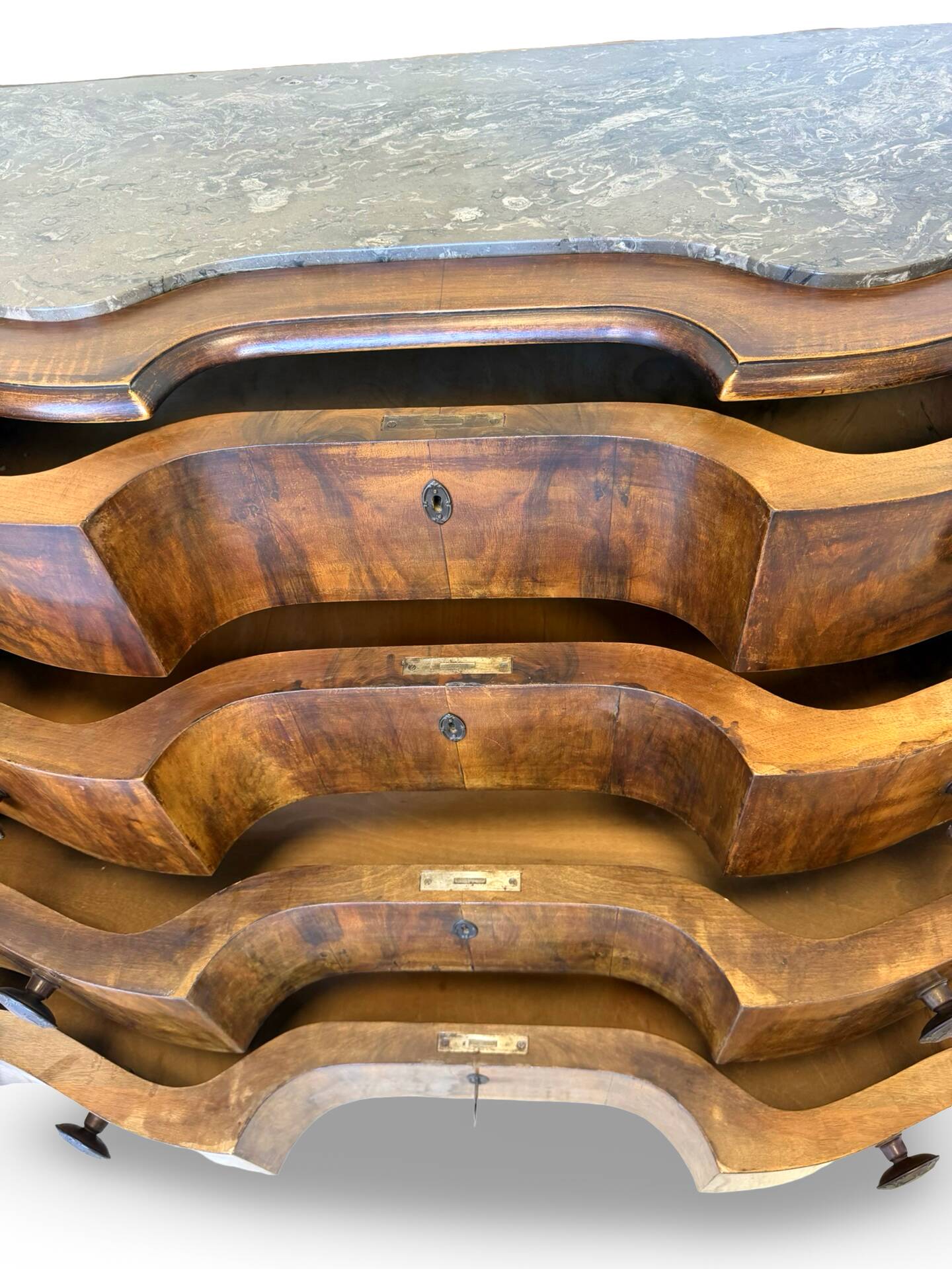 serpentine commode in antique walnut