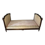 Antique Louis XVI style daybed in carved wood and patterned fabric