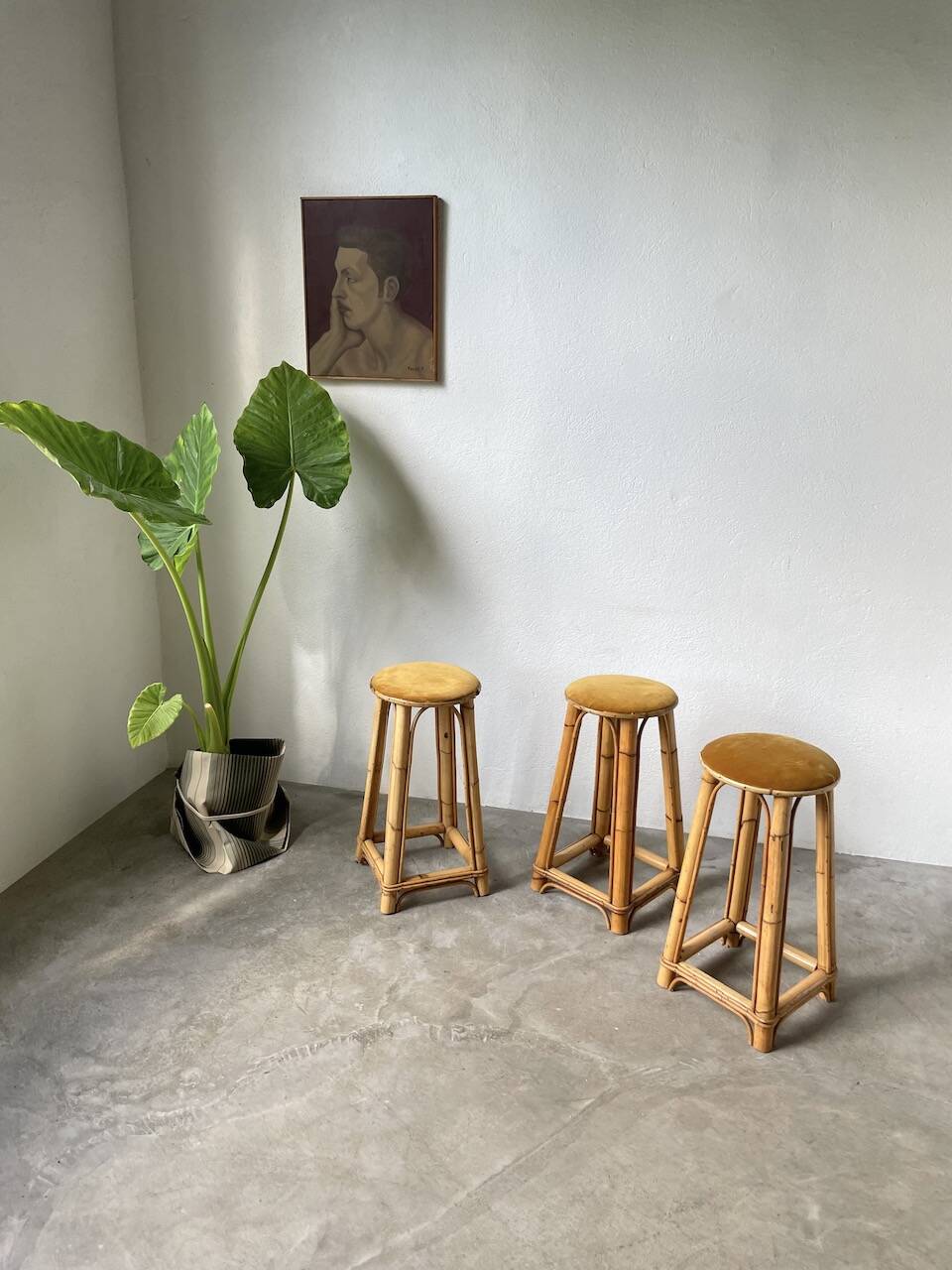 Set of three rattan high stools