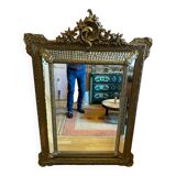 Bevelled mirror with gilded stucco parclose, from the Napoleon III period