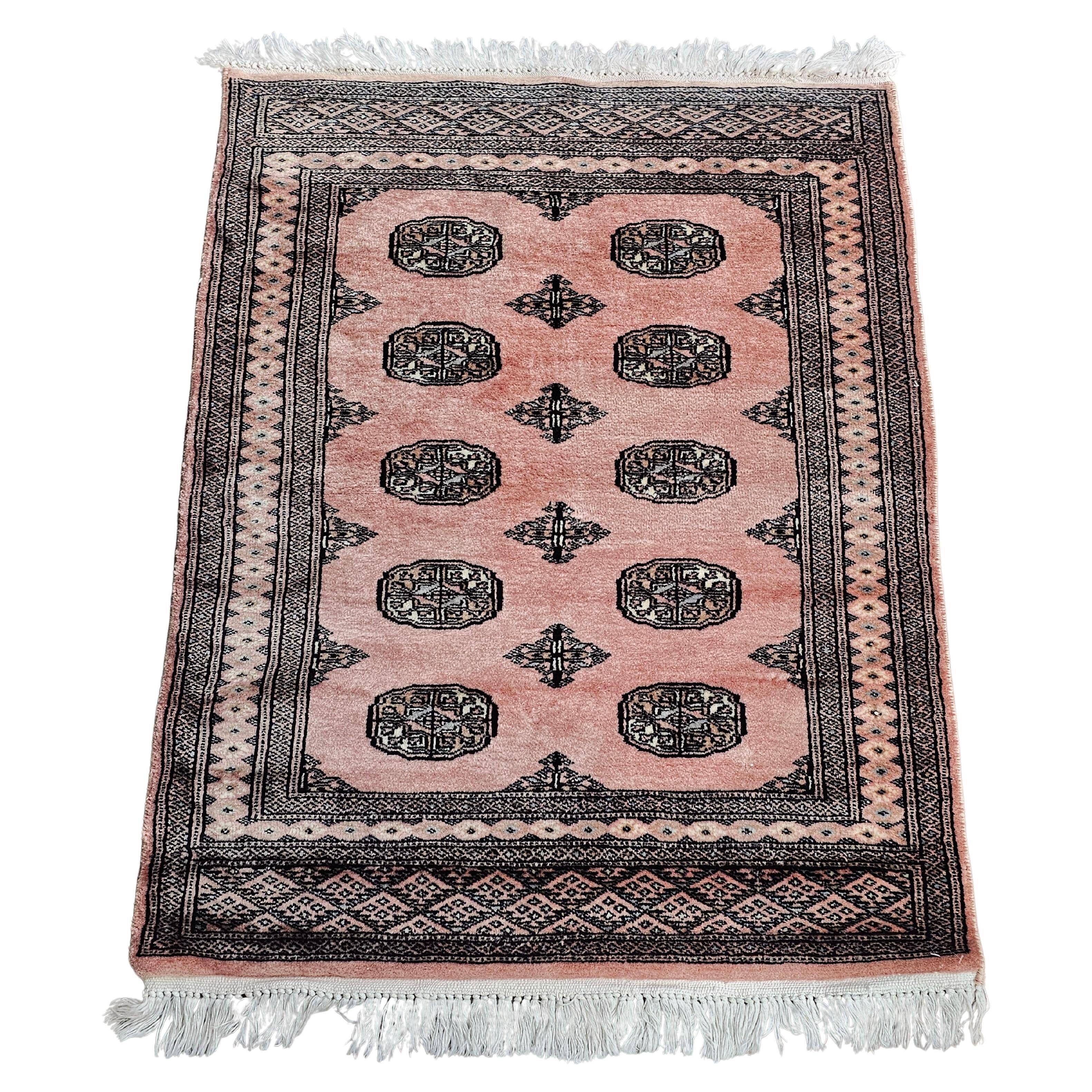Tapis vintage noué main Bokhara Pakistan années 1950