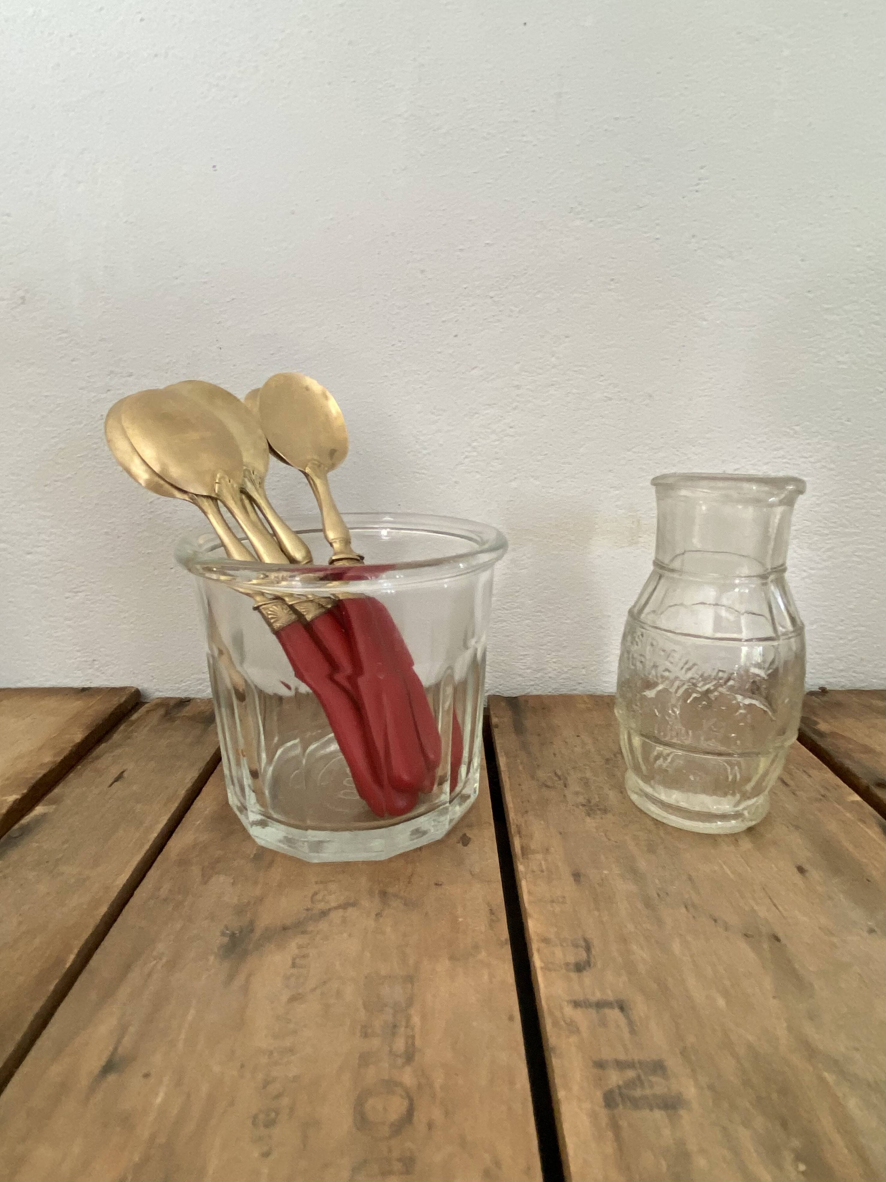 Six cuillères à glace en laiton et bakélite