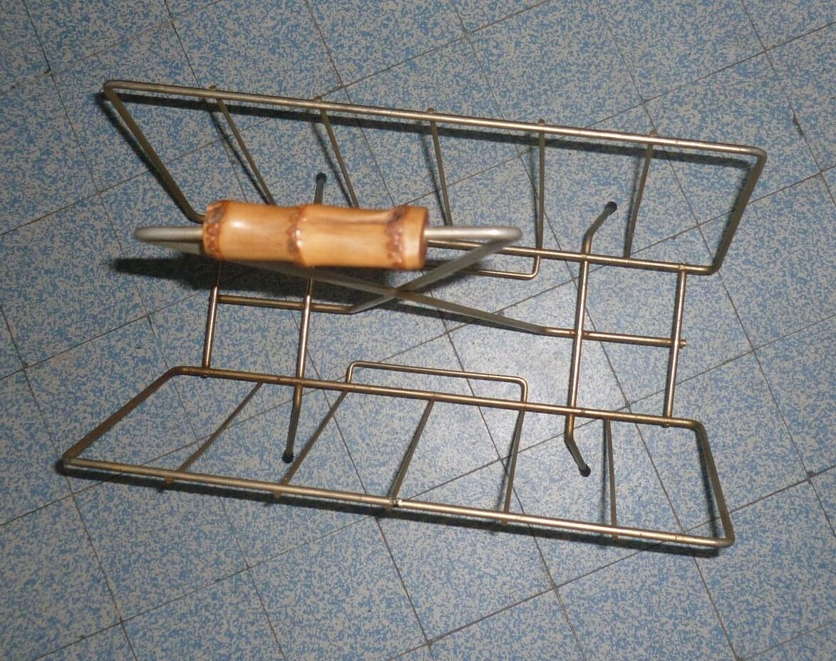 Vintage brushed gold steel magazine holder