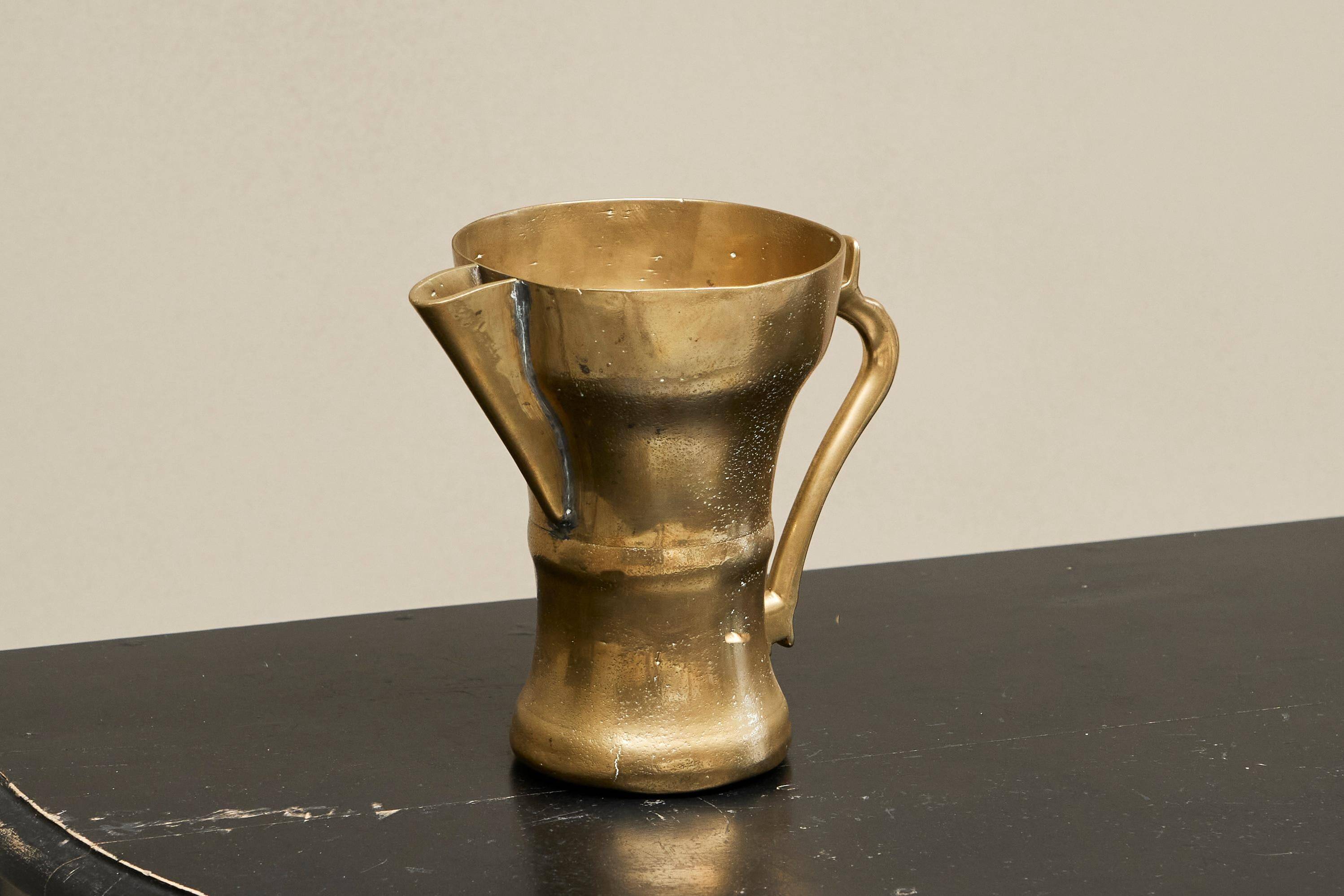 Antique brass jug, 19th century.