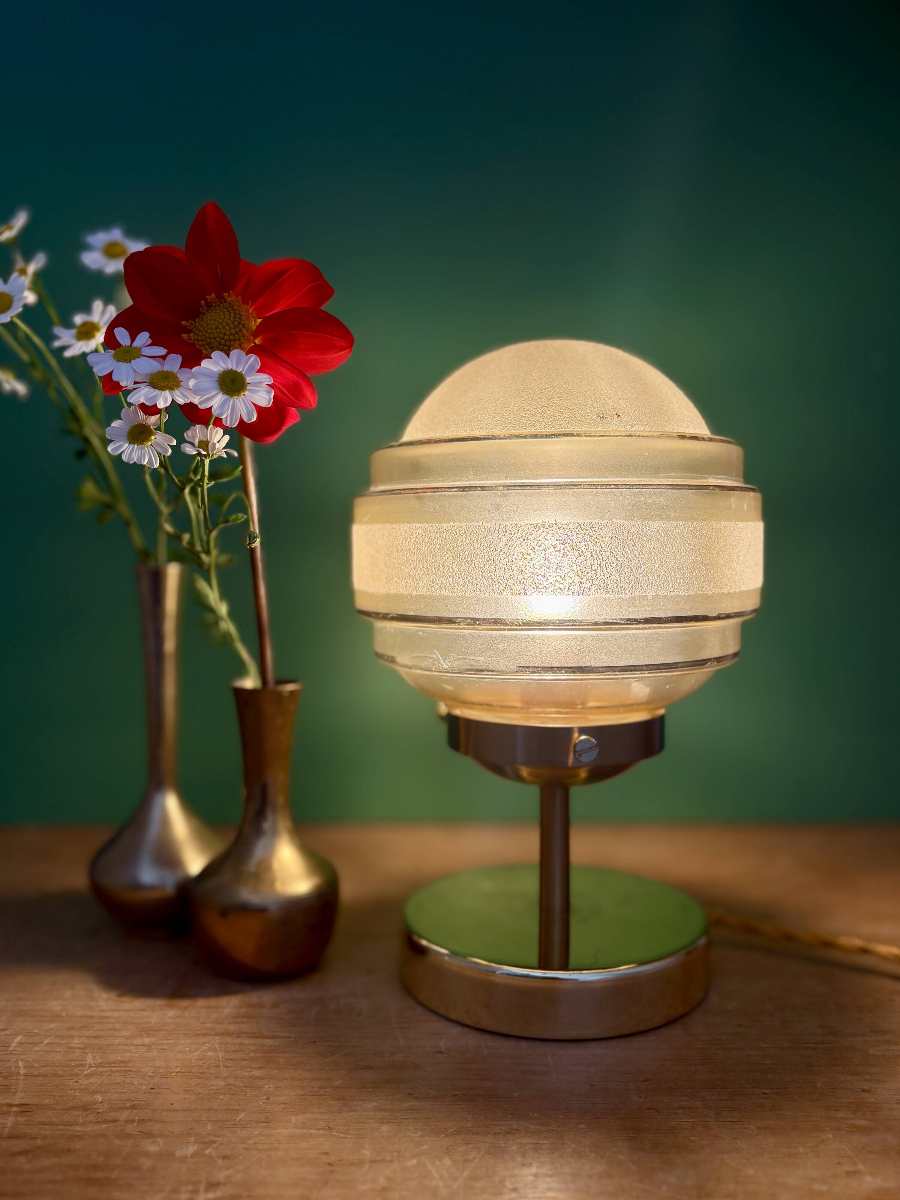 Vintage globe table lamp in frosted yellow and gold glass.
