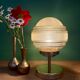 Vintage globe table lamp in frosted yellow and gold glass.