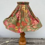 Turned wood lamp with flower shade