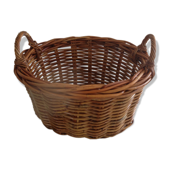 Oval basket with two handles in braided rattan