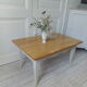 Vintage coffee table patinated pearl gray waxed finish, top against glued varnished oak