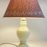 White marble lamp and vintage linen