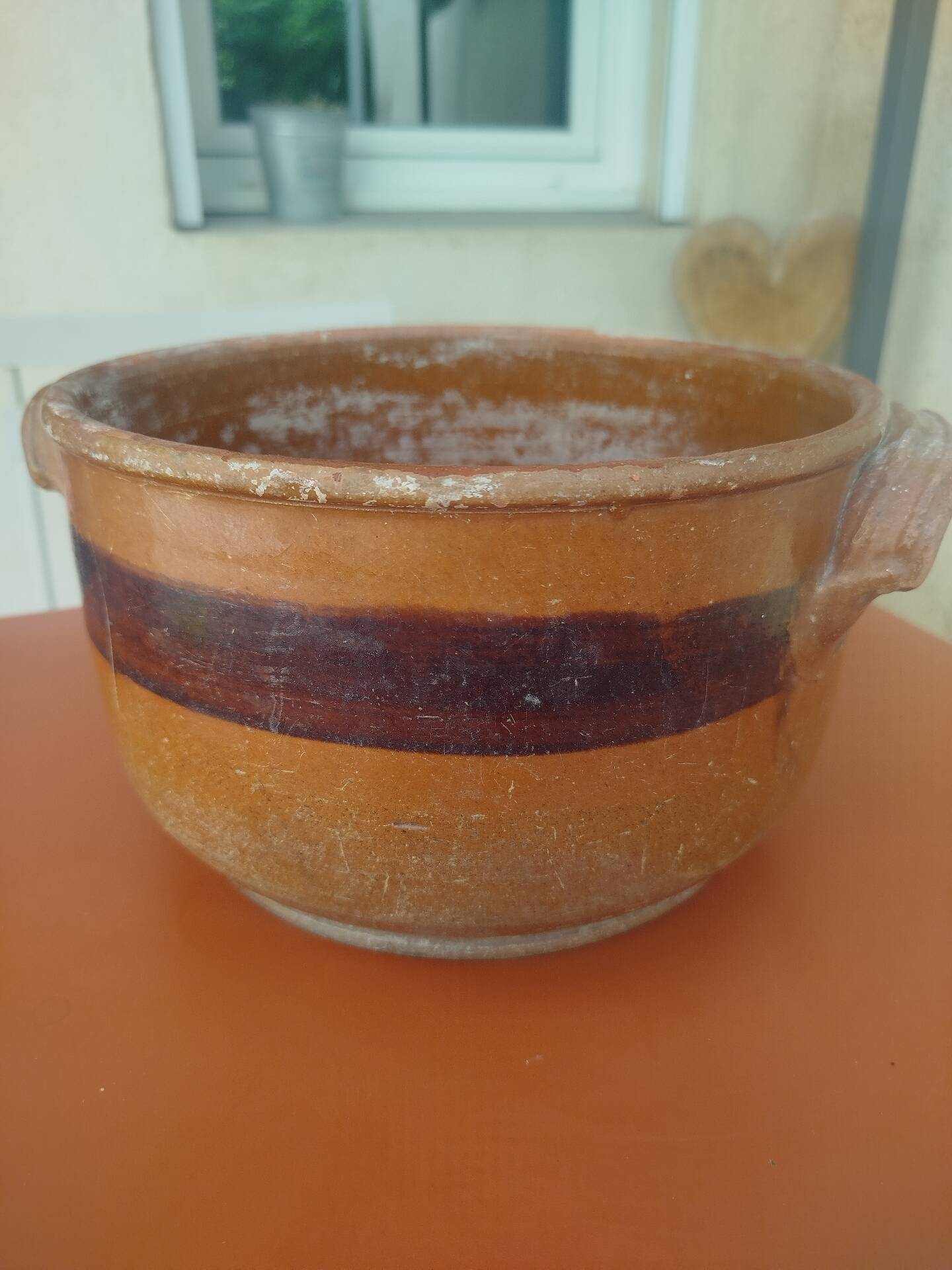 Old terracotta casserole