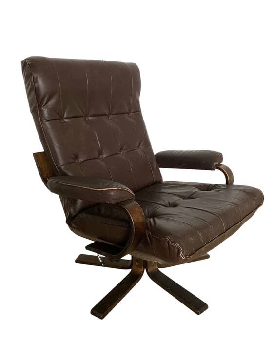 Vintage Scandinavian armchair in curved wood and leather