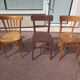 Set of 12 mismatched wooden bistro chairs