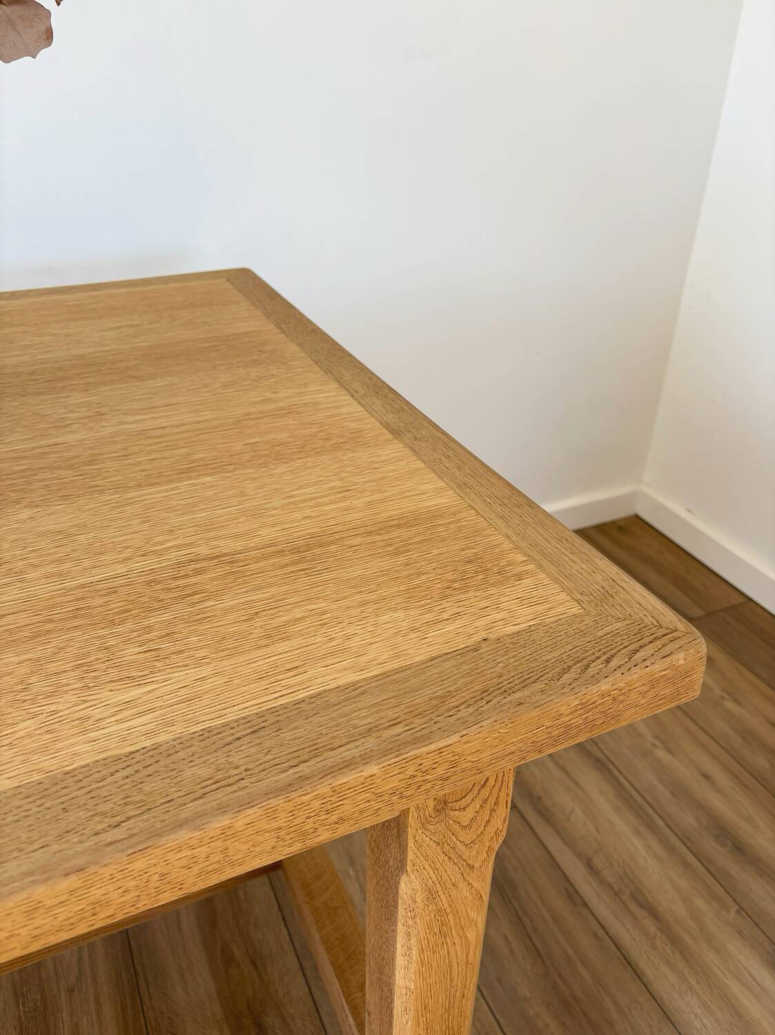 Solid oak farmhouse table with extensions.