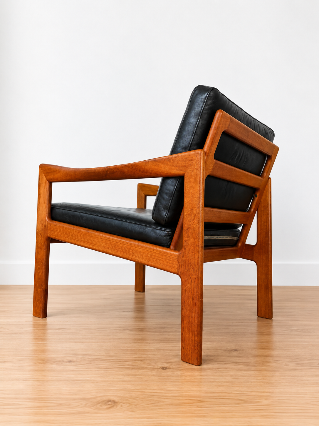 Vintage Danish Illum Wikkelsø teak lounge chair model 20