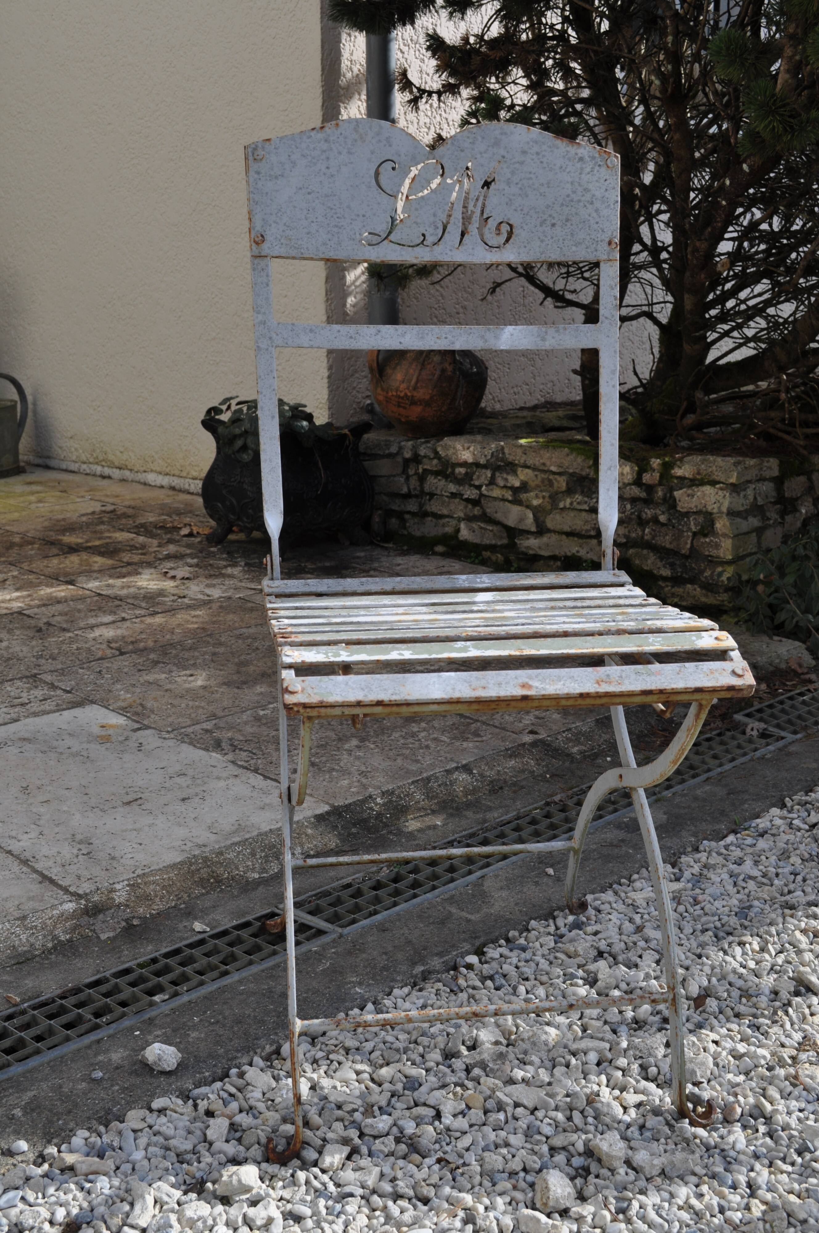 L M monogrammed metal garden chairs