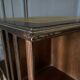 Bibliotheque tournante en acajou anglaise XXe pieds griffes cuir vert