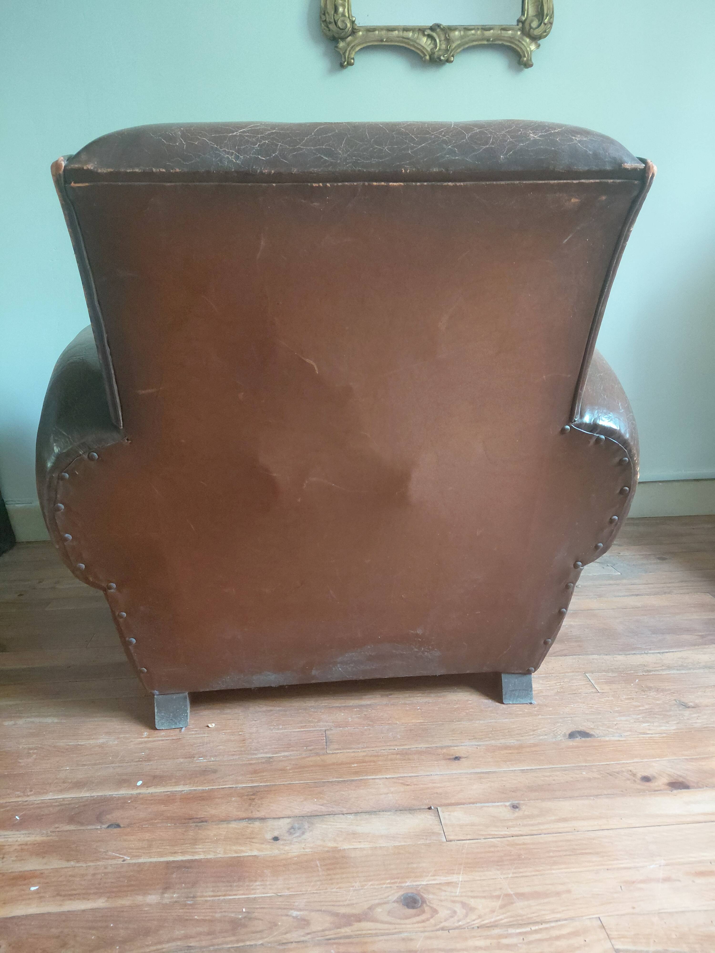 Club armchair, patinated leather